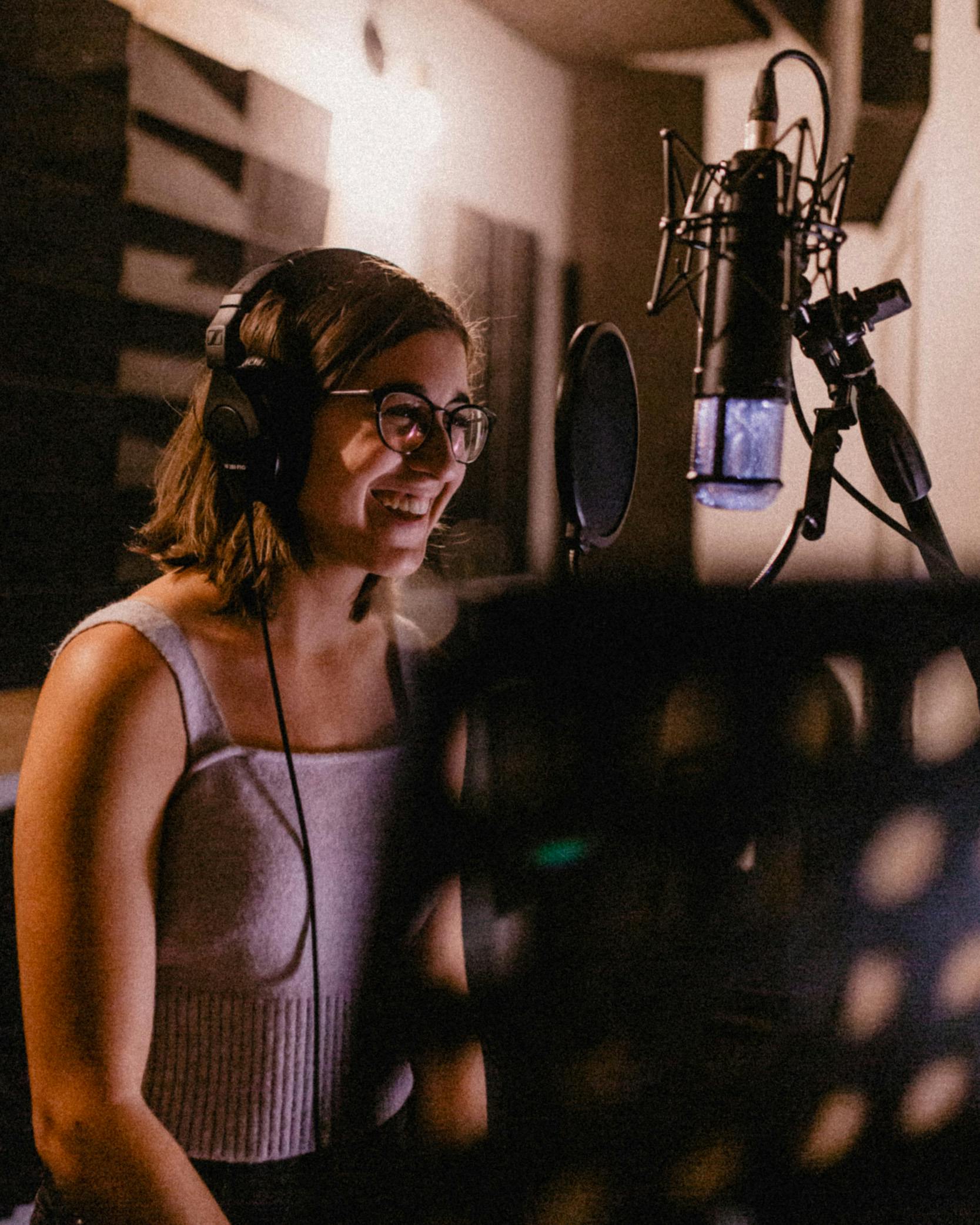 Pop music artist Jenna Soroka recording vocals in Edmonton recording studio Velveteen Studios with Juno nominated producers Randor Lin and Mike Schlosser