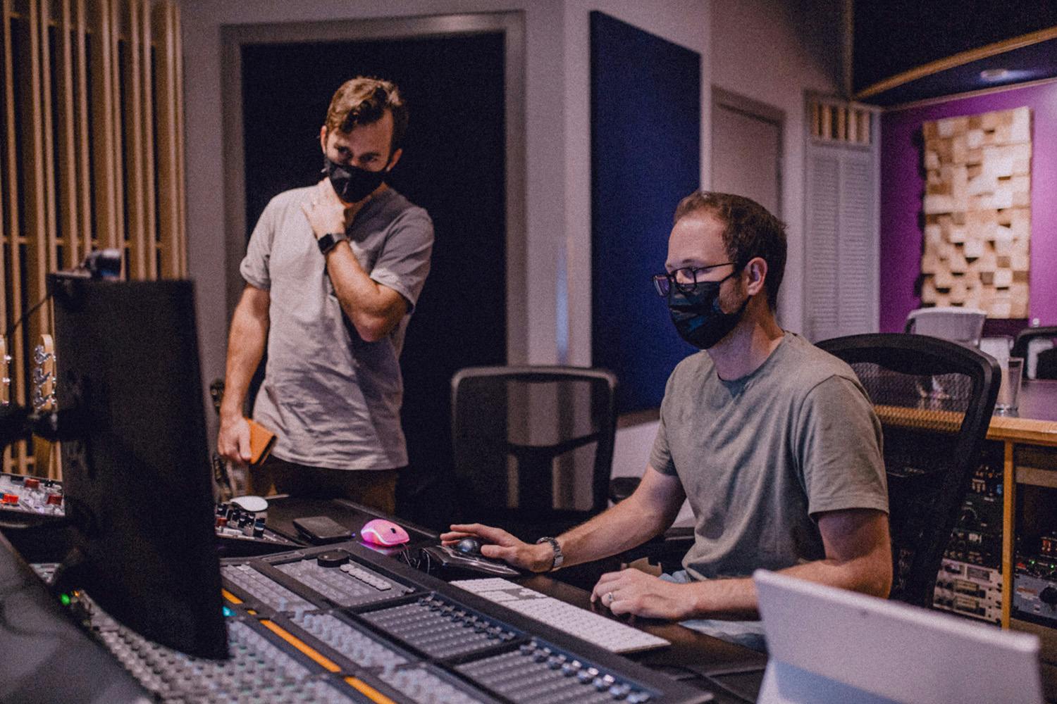 Music Producers Bradley J Simons and Brandon Unis working on a production at Edmonton Recording studio Velveteen Music