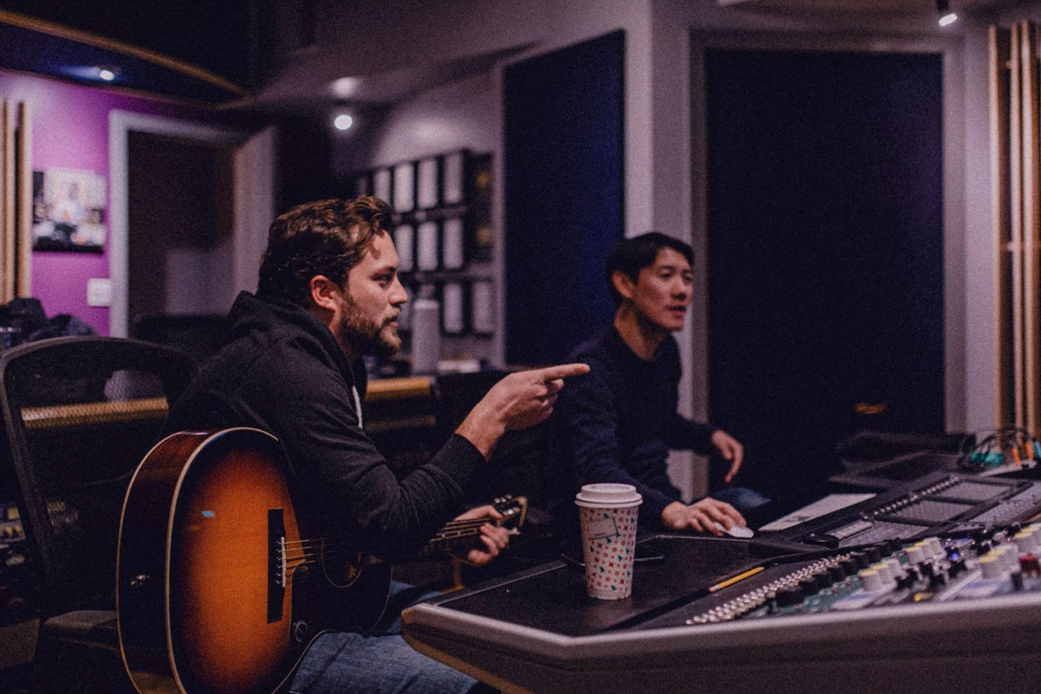 Music artist Thomas O'Hara working with music producer Randor Lin at Edmonton Recording Studio Velveteen Music